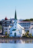 Reykjavic, Iceland city scape - lake quay in city center.