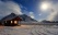 Cottage in mountains in the moonlight