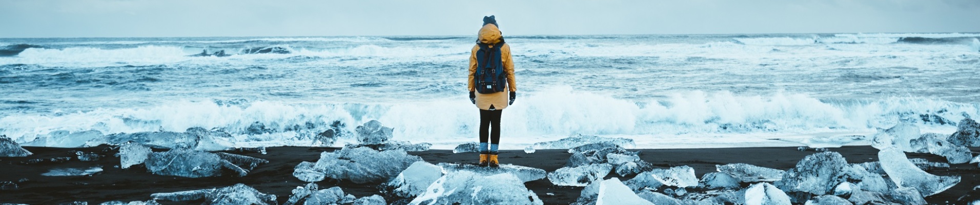 Girl on Diamond Beach in Iceland