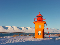 Orange lighthouse near Akureyri ​